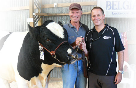 Lockwood Smith and Prime Minister John Key with one of Woodleigh's Belgian Blue Champion Bulls